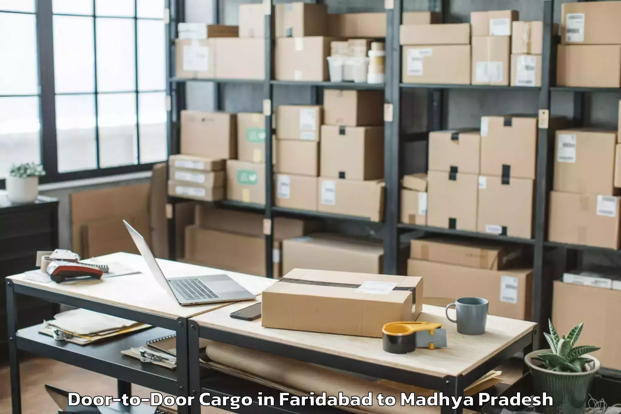 Top Faridabad to Shujalpur Door To Door Cargo Available